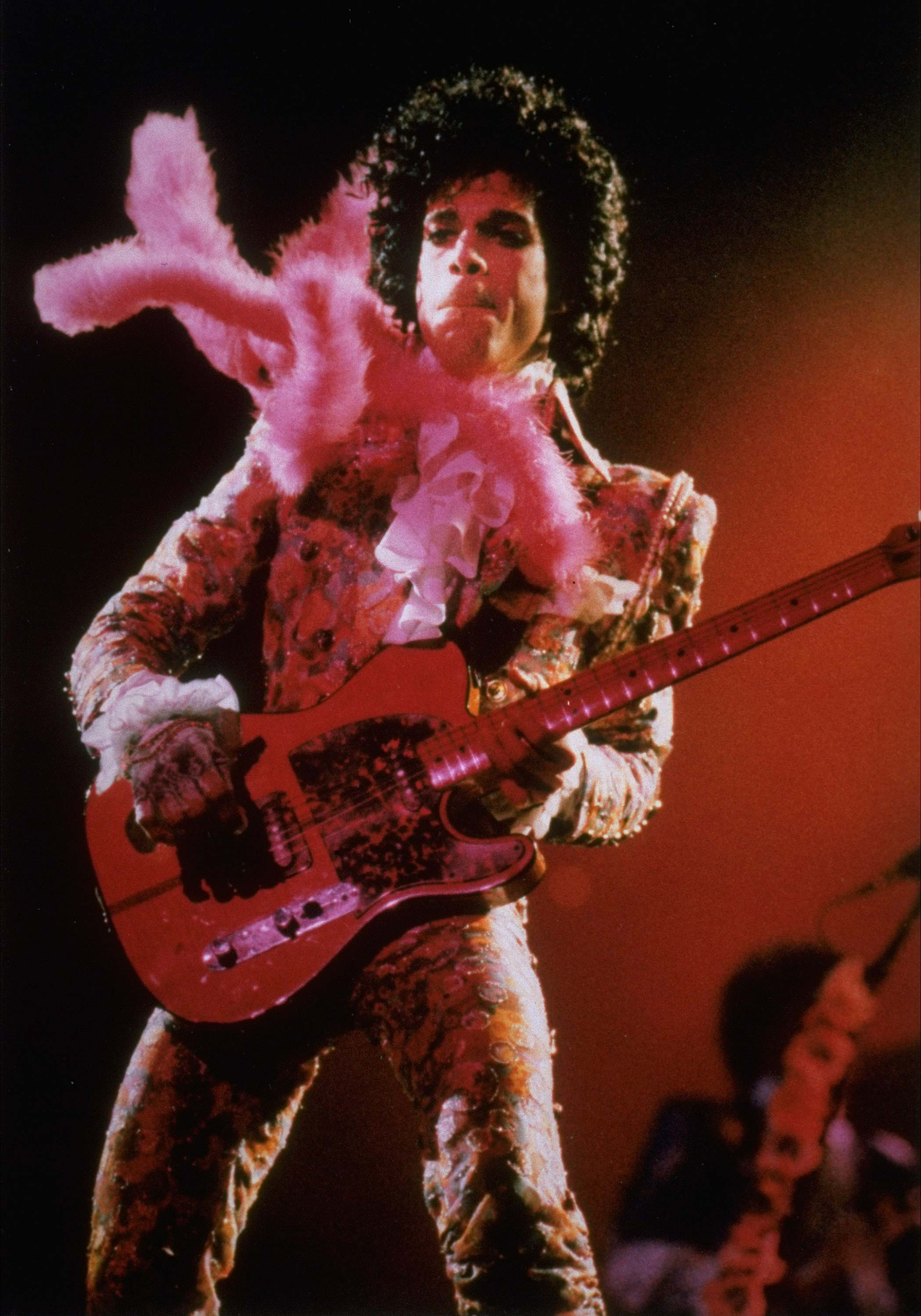 Prince performs Jan. 11, 1985, before a sold-out audience, in Houston. Prince's publicist has confirmed that Prince died at his his home in Minnesota, Thursday, April 21, 2016. He was 57. (AP Photo/F.