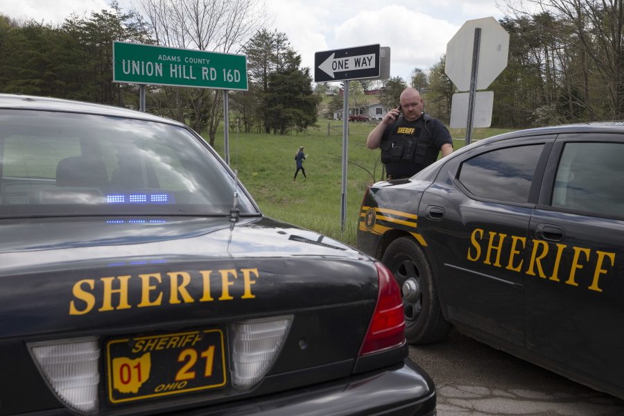 Authorities create a perimeter near a crime scene on Union Hill Rd, Friday, April 22, 2016, in Pike County, Ohio. Shootings with multiple fatalities were reported along a road in rural Ohio on Friday morning, but details on the number of deaths and the whereabouts of the suspect or suspects weren&#039;t immediately clear. The attorney general&#039;s office said a dozen Bureau of Criminal Investigation agents had been called to Pike County, an economically struggling area in the Appalachian region some 80 miles east of Cincinnati.