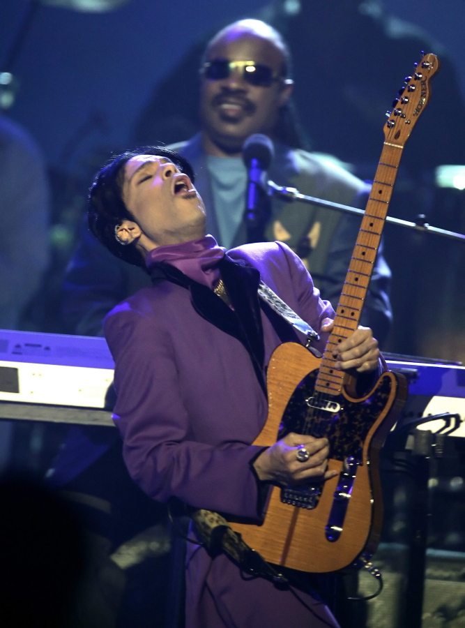 Prince, joined by Stevie Wonder at rear, performs during the sixth annual BET Awards in 2006 in Los Angeles. Since Prince&#039;s April 21 death, his record sales have increased by 40,000 percent.