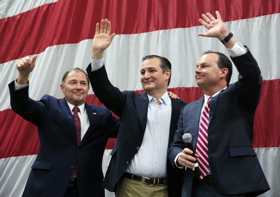 Utah Gov. Gary Herbert, from left, Republican presidential candidate, Sen. Ted Cruz, R-Texas, and Sen. Mike Lee, R-Utah, wave during a March 19 rally in Draper, Utah. Cruz has endorsed Utah Gov. Gary Herbert in his re-election effort. The Texas senator said Wednesday that the governor has been a principled leader since he took office in 2009.