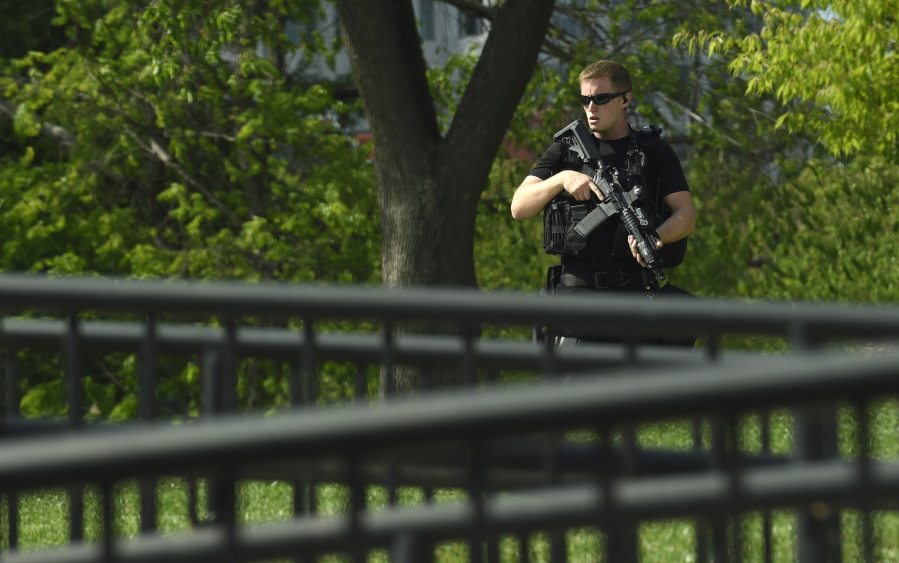 A uniformed Secret Service agent patrols the North Lawn of the White House on Tuesday in Washington.