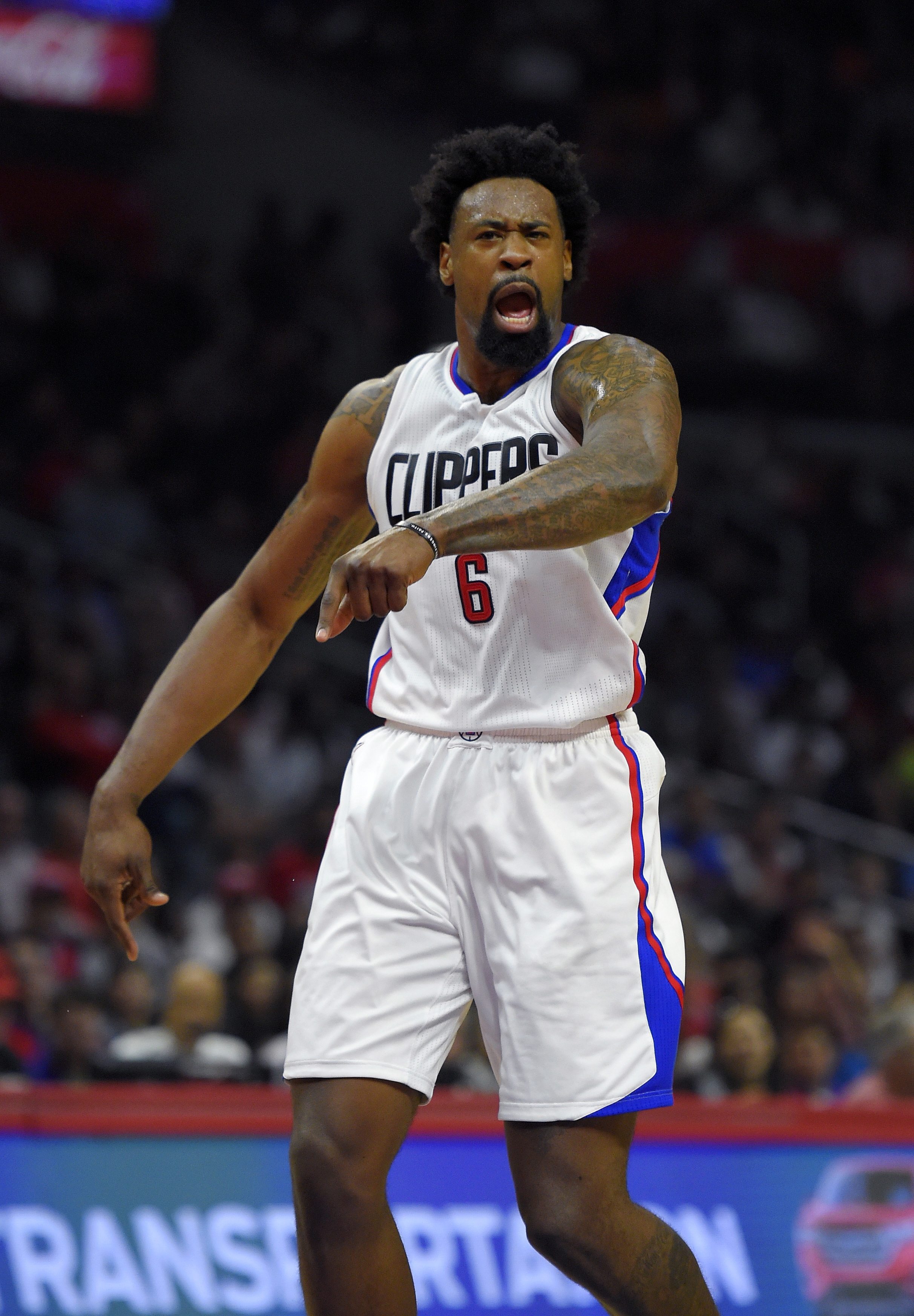 Los Angeles Clippers center DeAndre Jordan complains to referees after scoring during the first half of an NBA basketball game against the Washington Wizards, Sunday, April 3, 2016, in Los Angeles. (AP Photo/Mark J.
