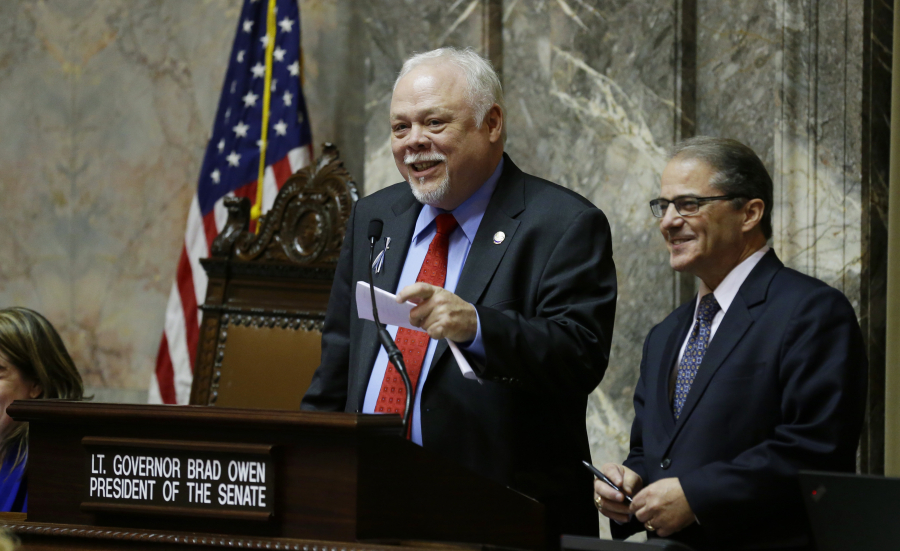 Sen. Don Benton, R-Vancouver, left, presides over the Senate at the invitation of Senate President and Lt. Gov. Brad Owen, right, March 10 at the Capitol in Olympia.