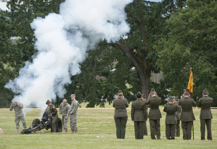 Washington National Guard soldiers with 2nd Battalion, 146th Field Artillery Regiment fire a 75 mm howitzer during the 2015 Memorial Day ceremony at Fort Vancouver. The howitzer will be fired as part of Monday&#039;s ceremony on the Parade Ground.