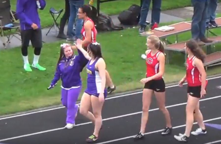In a screen capture from  a video of the race, Columbia River&#039;s Ellen Hardy, left, celebrates with Allison Frank after running the 400-meter relay in a meet against Camas.