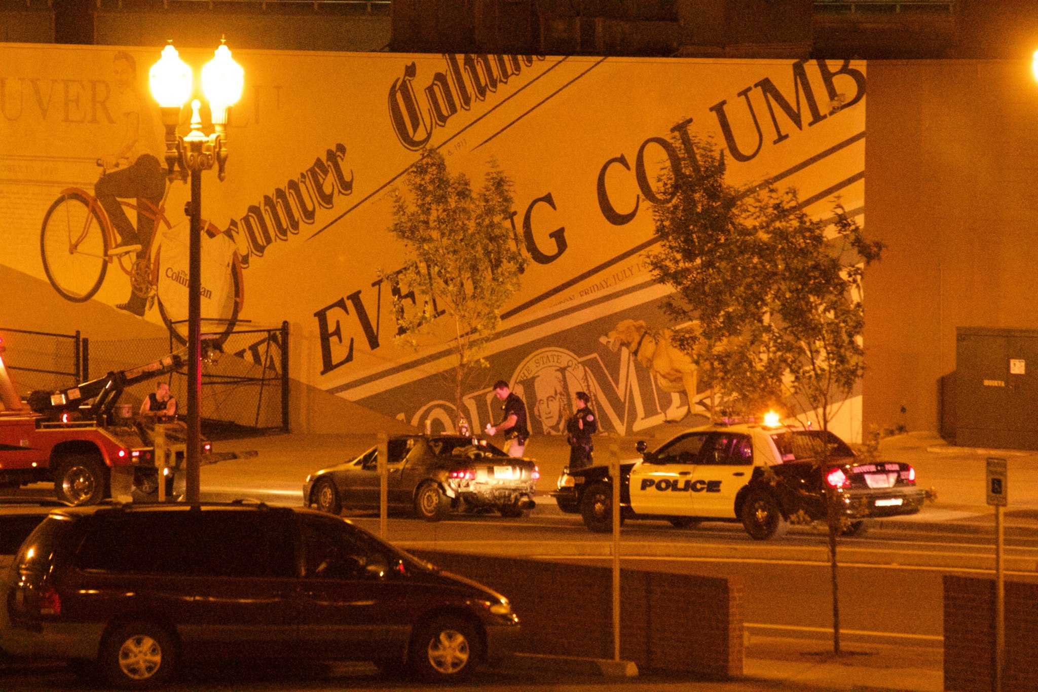 Police investigate an abandoned vehicle on Eighth and Grant streets in downtown Vancouver on Thursday night.