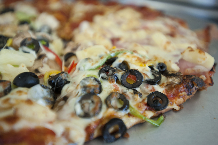 Slices of Hippy pizza are served Friday at High 5 Pizza in Vancouver.