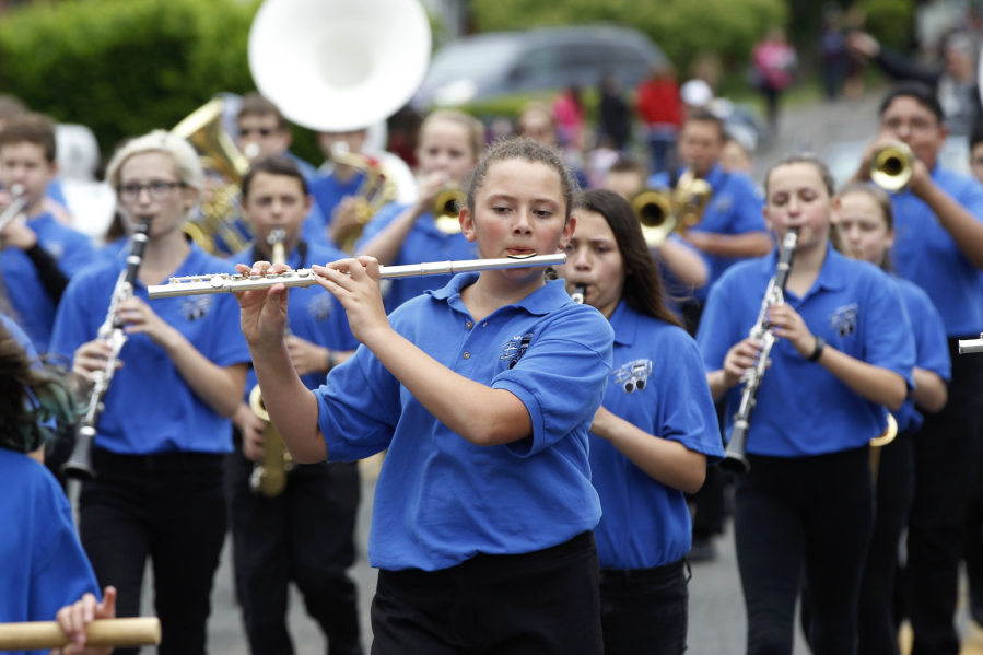 The Maple Grove Middle School band of Battle Ground marches at the Hazel Dell Parade of Bands on Saturday. More than 150 floats and other parade attractions, including 28 middle and high school marching bands participated.
