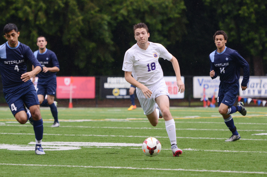 Columbia River junior Ethan Adams finds open field against Interlake during a 3A boys soccer state quarterfinal game at Kiggins Bowl in Vancouver on Saturday, May 21, 2016. Interlake beat Columbia River 3-1.
