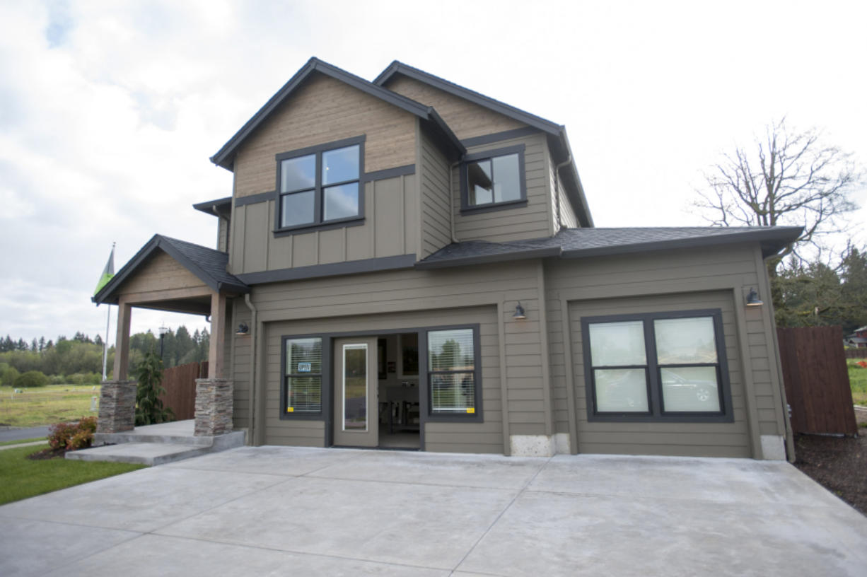 This new house in Brush Prairie includes a great room and a first-floor office/guest room, two popular features in new homes.