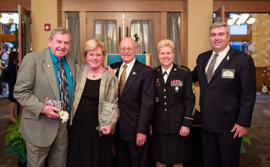 Central Park: Jane Hagelstein, second from left, accepting her presidential award, along with Royce Pollard, left, former Vancouver mayor, Les Burger, retired military officer, Kelly Jones, resource center manager, and Bob Knight, Clark College president.