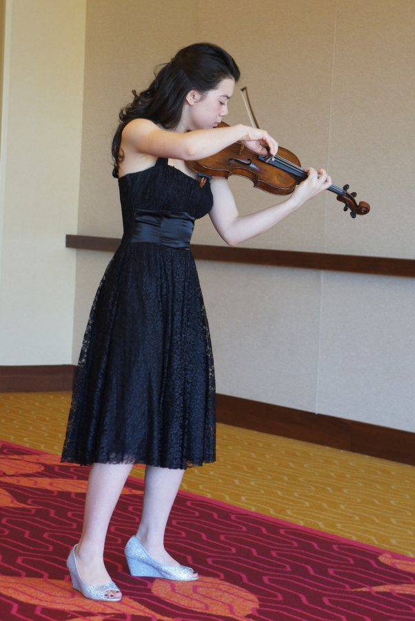 Lake Shore: Symphony Koss, seen here warming up before a national competition in Texas this April, earned a full scholarship to the Interlochen Arts Camp in Michigan.