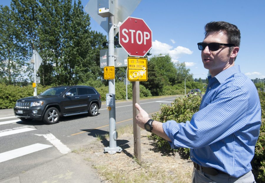 Washington State Department of Transportation spokesman Bart Treece explains on Monday the benefits of an improved crosswalk at the state Highway 14 onramp from Columbia House Boulevard in west Vancouver.