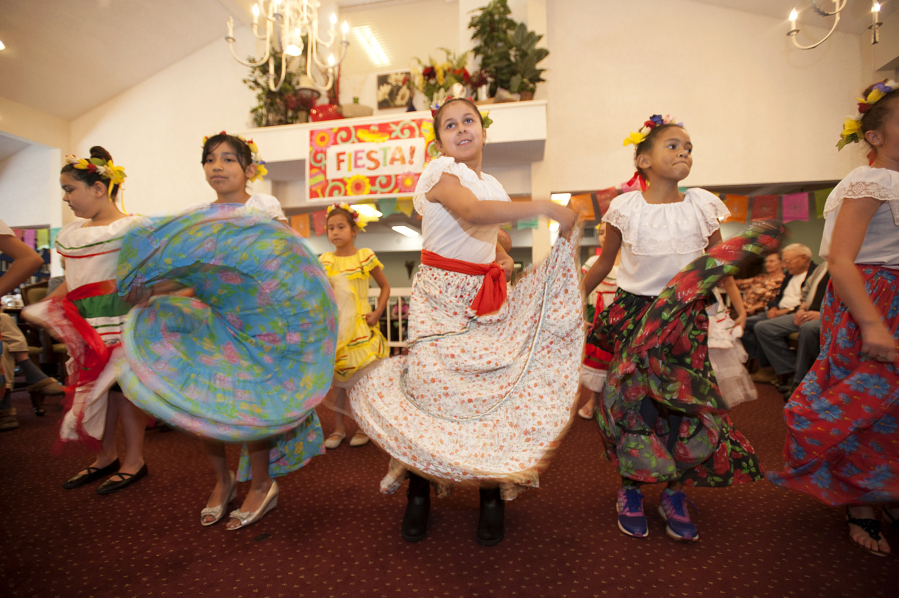 Students from Pioneer Elementary School&#039;s Dual Immersion dance troupe the Mexican Dancers celebrate Cinco de Mayo with a festive dance at Kamlu Retirement Inn.