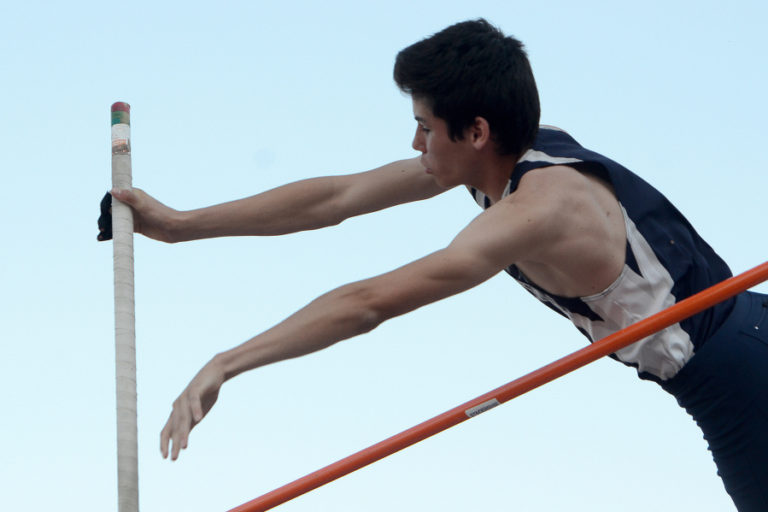 Skyview junior Samuel Gunn clears the bar while pole vaulting during the first day of the Greater St. Helens 4A district championship track meet at McKenzie Stadium in Vancouver on Wednesday, May 11, 2016. The meet continues on Friday.