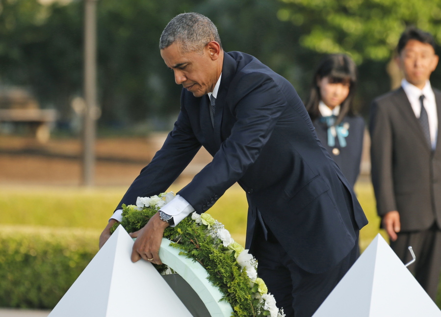 U.S. President Barack Obama lays wreaths Friday at the cenotaph at Hiroshima Peace Memorial Park in Hiroshima, western Japan. Obama on Friday became the first sitting U.S. president to visit the site of the world&#039;s first atomic bomb attack, bringing global attention both to survivors and to his unfulfilled vision of a world without nuclear weapons.