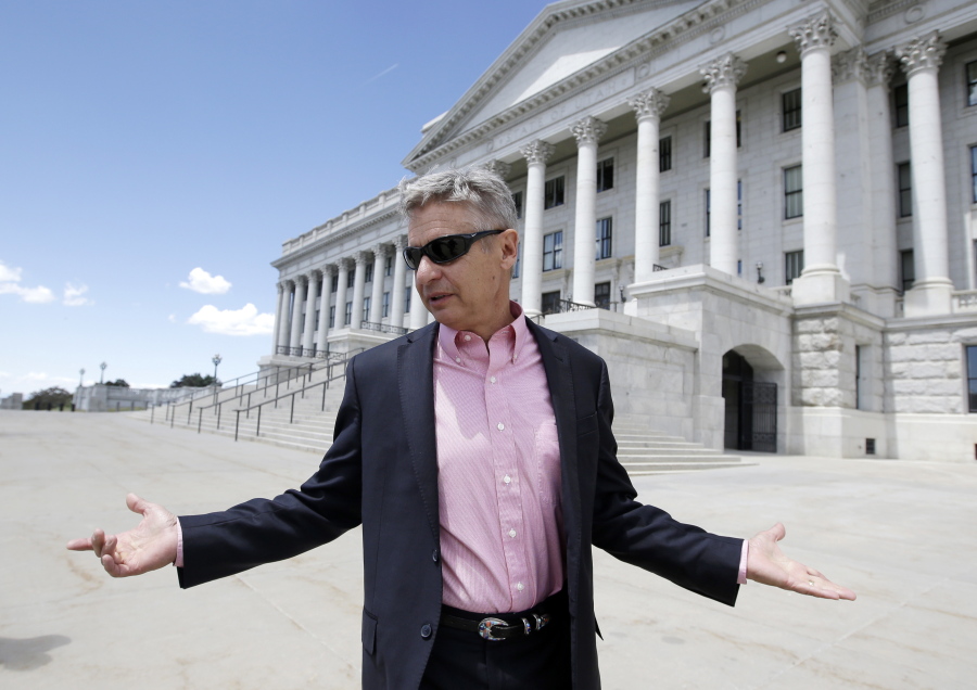 Libertarian presidential candidate and former New Mexico Gov. Gary Johnson leaves the Utah State Capitol after meeting with legislators in Salt Lake City.