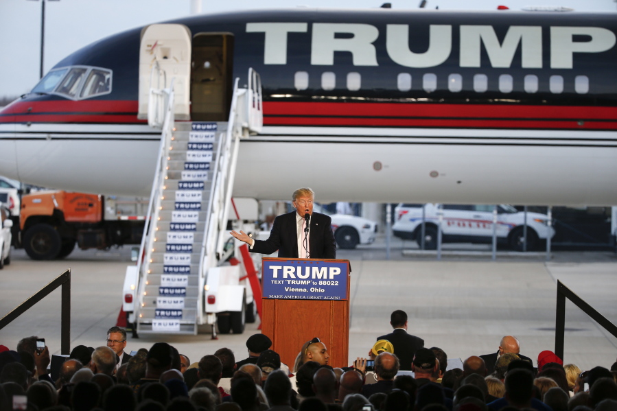 Republican presidential candidate, Donald Trump holds a plane-side rally in a hanger at Youngstown-Warren Regional Airport in Vienna, Ohio, in March.  (AP Photo/Gene J.