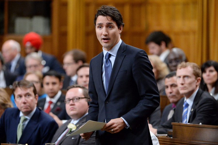 Prime Minister Justin Trudeau answers questions from opposition MPs as he addresses the House of Commons on Parliament Hill in Ottawa on Thursday. Trudeau apologized for his conduct following an incident in the House Wednesday when he pulled Conservative whip Gord Brown through a clutch of New Democrat MPs to hurry up a vote related to doctor-assisted dying.