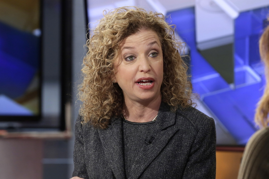 Democratic National Committee Chair Rep. Debbie Wasserman Schultz is interviewed March 21 in New York. Seeking to defuse tensions, the DNC said Friday it will hold public hearings around the country to develop the platform for its summer convention, a focal point for supporters of presidential candidate Bernie Sanders. Wasserman Schultz announced that a 15-member platform drafting committee will hold hearings in Washington on June 8-9, Phoenix on June 17-18, St. Louis on June 24-25 and Orlando, Fla., on July 8-9, about two weeks before the Philadelphia convention.