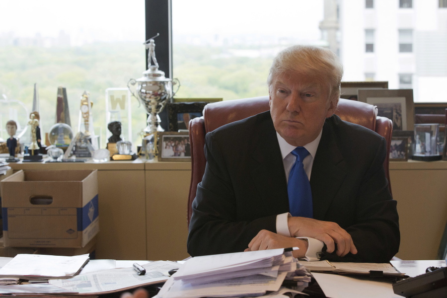 Republican presidential candidate Donald Trump is photographed during an interview with The Associated Press in his office at Trump Tower in New York.