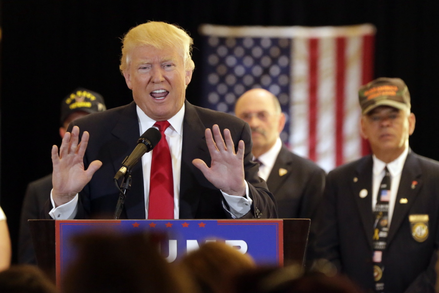 Republican presidential candidate Donald Trump answers questions during a news conference in New York on Tuesday.