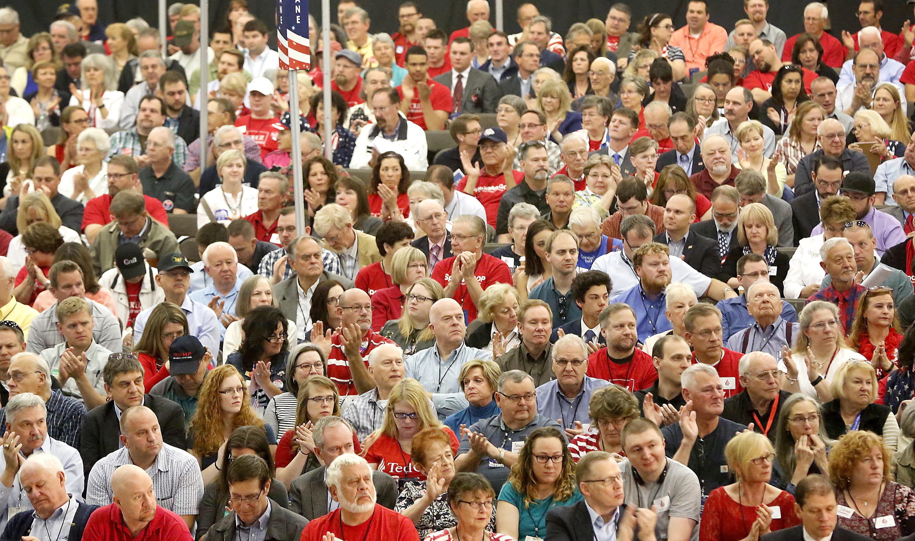 Delegates, alternates and other Republican officials listen and react to a speech by Rep. Dan Newhouse during the opening session of the Washington State Republican convention in the arena of the TRAC facility in Pasco, Wash., Friday, May 20, 2016. Republicans said they can win more statewide political offices in Washington if they are able to flip Snohomish County to the GOP side.