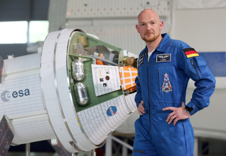 German astronaut Alexander Gerst poses next to a model of the spacecraft Orion in the European Astronaut Center, EAC, of the European Space Agency, ESA, in Cologne, Germany, on Wednesday.