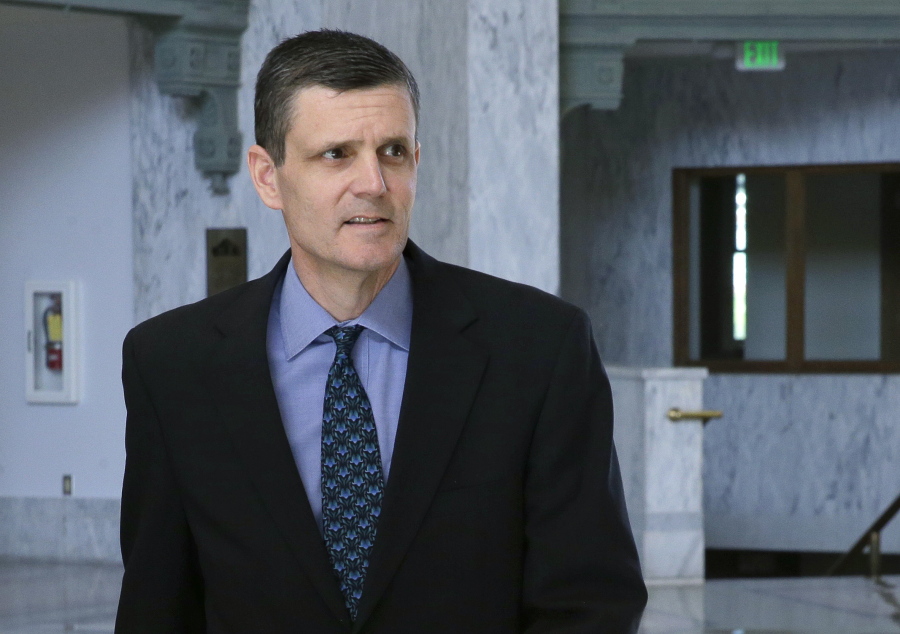 Washington State Auditor Troy Kelley leaves the federal courthouse April 20 in Tacoma. (AP Photo/Ted S.