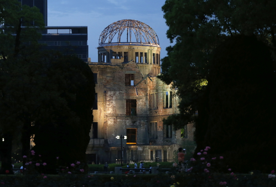 The Atomic Bomb Dome is lit at dusk at the Hiroshima Peace Memorial Park in Hiroshima, southwestern Japan, on Thursday. U.S. President Barack Obama is to visit Hiroshima on Friday, May 27 after the Group of Seven summit in central Japan, becoming the first serving American president to do so.