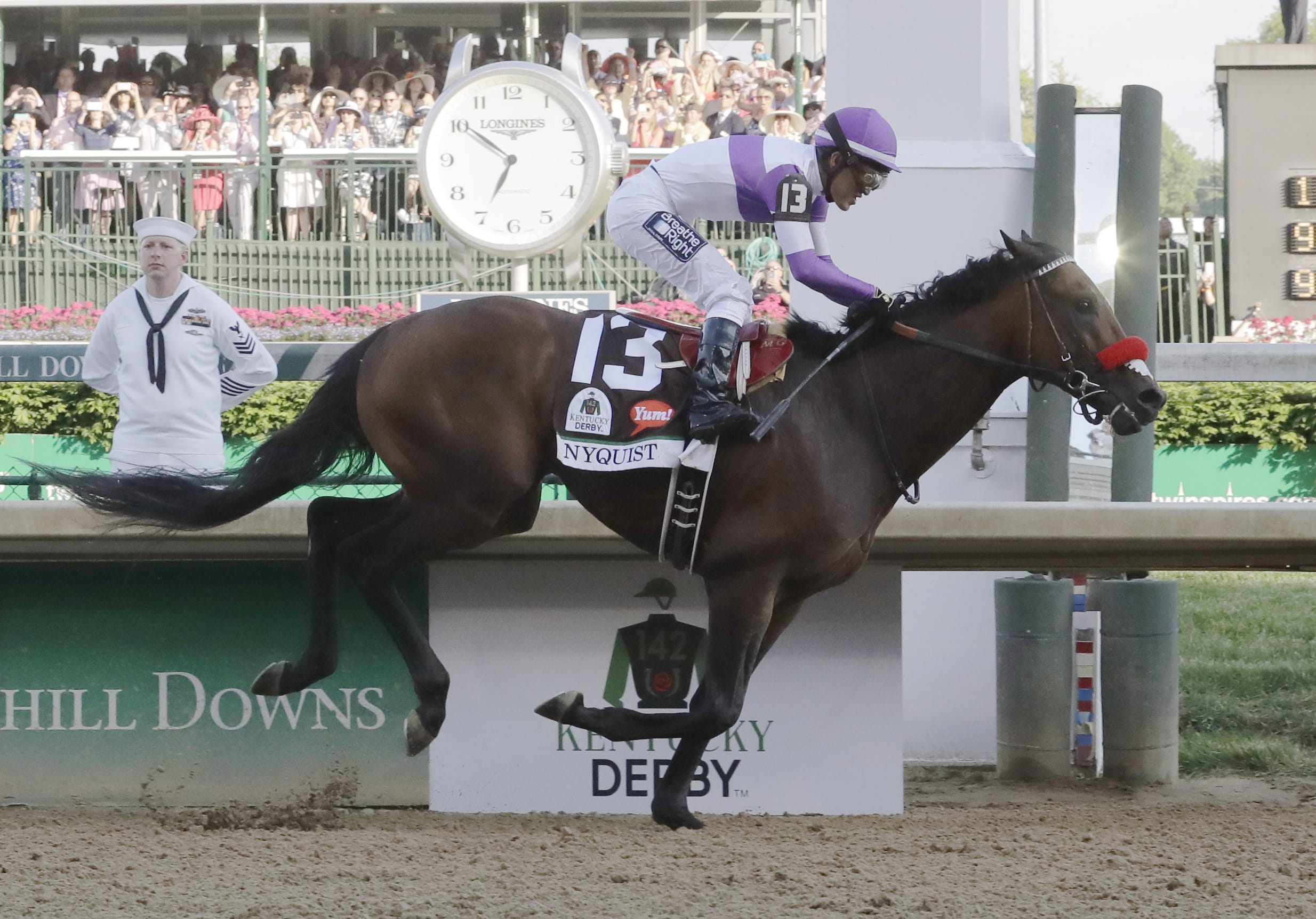 Mario Guitierrez rides Nyquist to victory during the 142nd running of the Kentucky Derby horse race at Churchill Downs Saturday, May 7, 2016, in Louisville, Ky.
