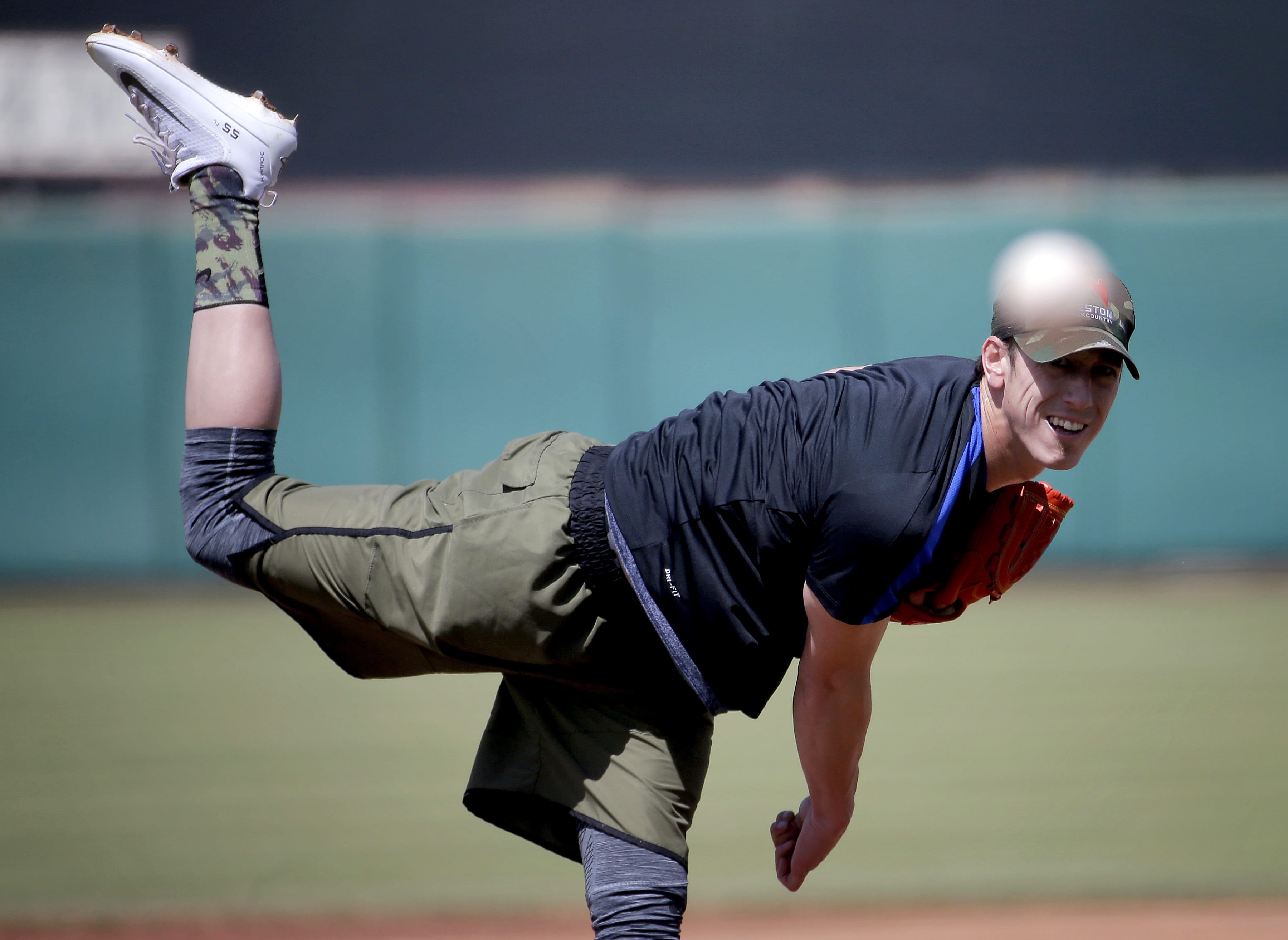 Pitcher Tim Lincecum throws for MLB baseball scouts, Friday, May 6, 2016, at Scottsdale Stadium in Scottsdale, Ariz. The former two-time Cy Young award winner is currently a free agent working his way back from hip surgery.