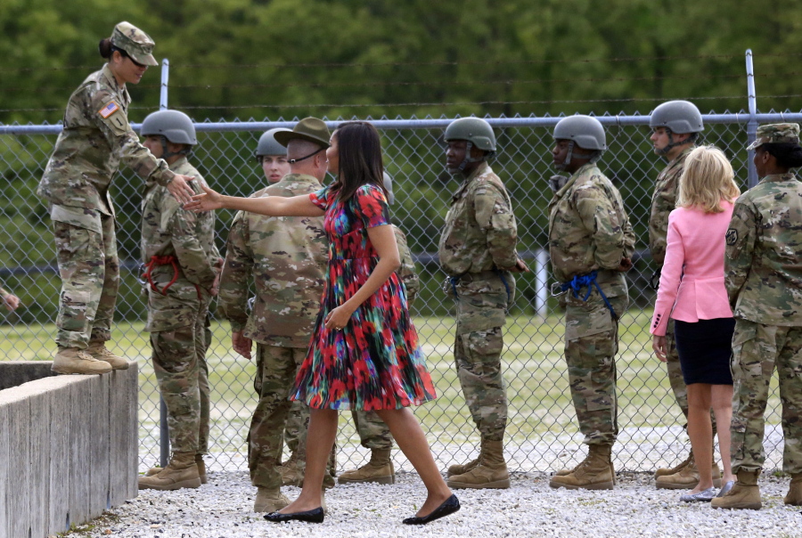 First lady Michelle Obama shakes hands with a soldier at Fort Leonard Wood, Mo., on Tuesday.