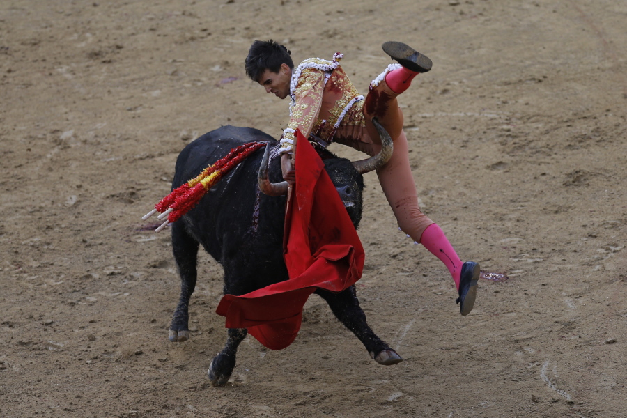Spanish bullfighter Gonzalo Caballero is gored in his left thigh Thursday by an El Ventorillo&#039;s ranch fighting bull during a bullfighting at the Las Ventas bullring in Madrid, Spain. As matadors face half-ton bulls this month during Madrid&#039;s most important annual series of bullfights and Pamplona gears up for its chaotic July bull runs, tensions are building between anti-bullfighting forces and the traditions&#039; defenders.