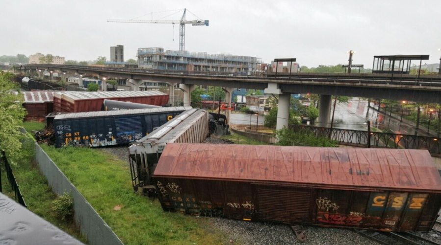 Several cars remain overturned after a CSX freight train derailed Sunday in Washington.