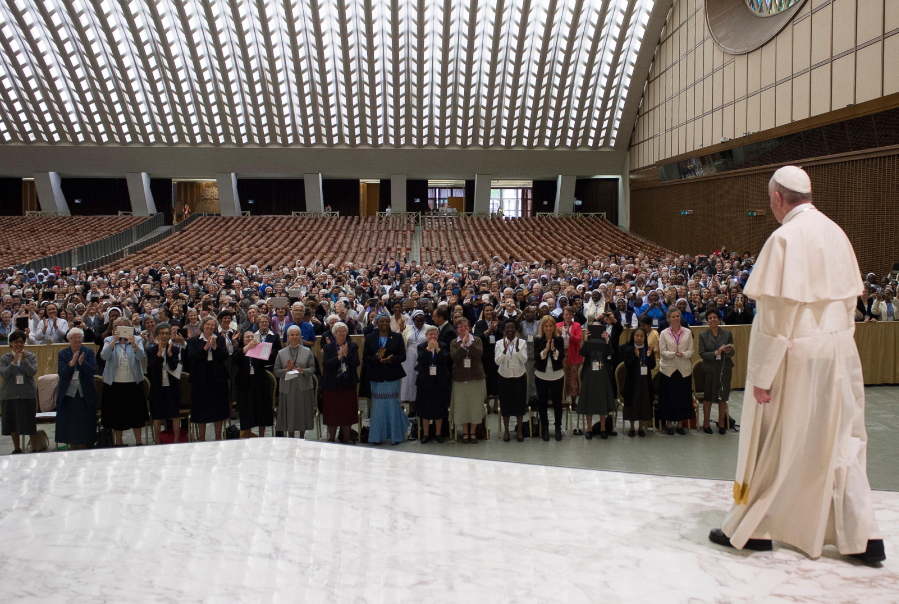 Pope Francis arrives for a special audience with Superiors General of Institutes of Catholic Women Religious in the Paul VI Hall at the Vatican on Thursday. Pope Francis said Thursday he is willing to create a commission to study whether women can be deacons in the Catholic Church, signaling an openness to letting women serve in ordained ministry currently reserved to men.