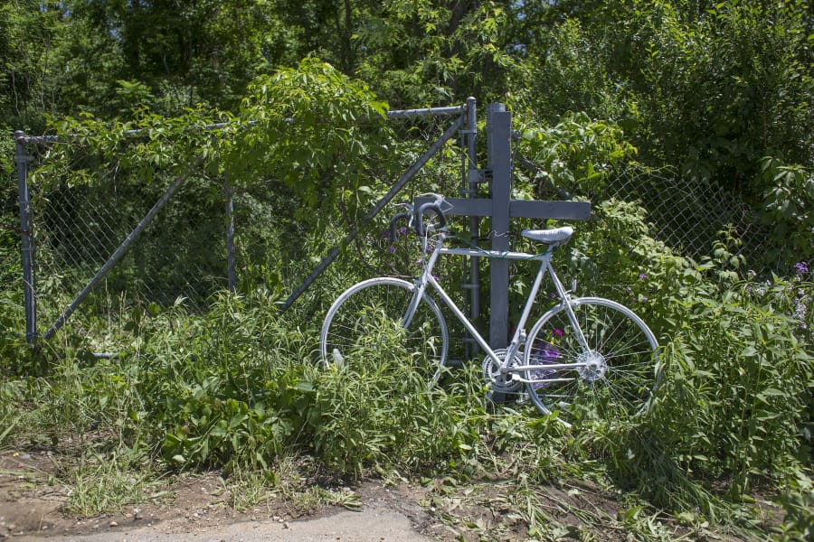 A "ghost bike" is set up as a memorial where five bicyclists where killed and four where injured when a pickup truck slammed into a group of cyclists Tuesday night.