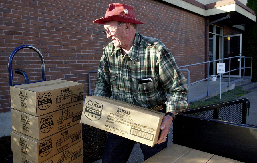 Bill Jessett, shown in 2003, volunteered to help feed the needy with the Inter-Faith Treasure House for around 30 years. He was killed in a car crash in Camas on Wednesday. He was 88.