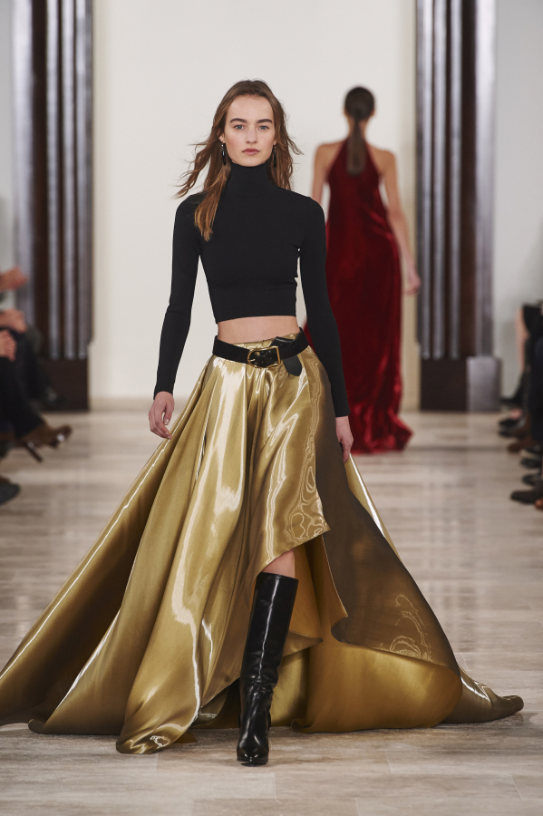An evening look in flowing gold lame from the Ralph Lauren Collection for fall 2016 was presented on Feb. 18 at New York Fashion Week. The company is overhauling its main three lines to become more profitable.