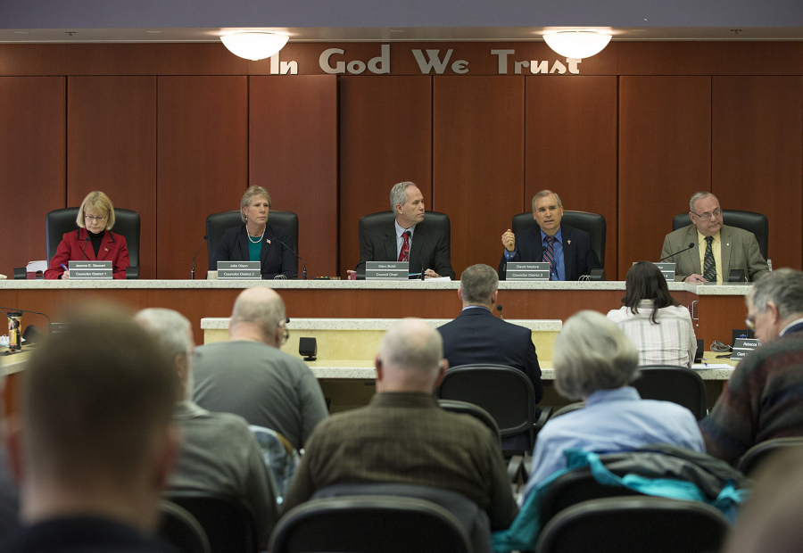 Clark County Councilors Jeanne Stewart, from left, Julie Olson, Marc Boldt, David Madore and Tom Mielke listen to testimony March 22 at the Clark County Public Service Center.