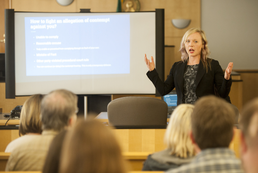 Vancouver attorney Amber Rush of Navigate Law Group teaches a free class on maneuvering through the family law system June 14 at the Clark County Courthouse. Several attorneys and court employees attended the noon-hour clinic, which is designed to help the public.