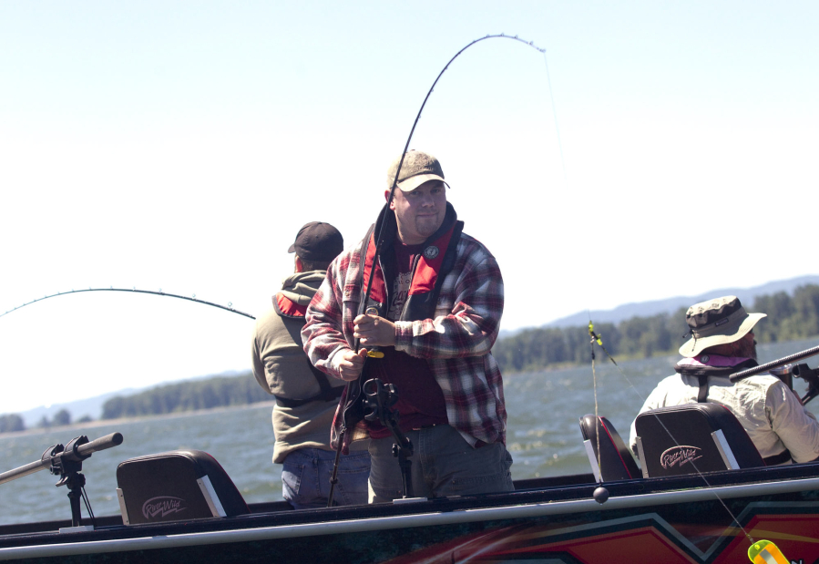 Veteran Matt Wirkkla takes part Sunday in the annual Operation Salmon Salute near Ridgefield. The event took veterans out on the Lake and Columbia rivers for a day of guided fishing.