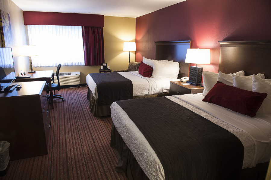 Part of the remodeling of the Best Western hotel in Woodland included a color palette of dark wood, chocolate browns, burnt orange and reds.