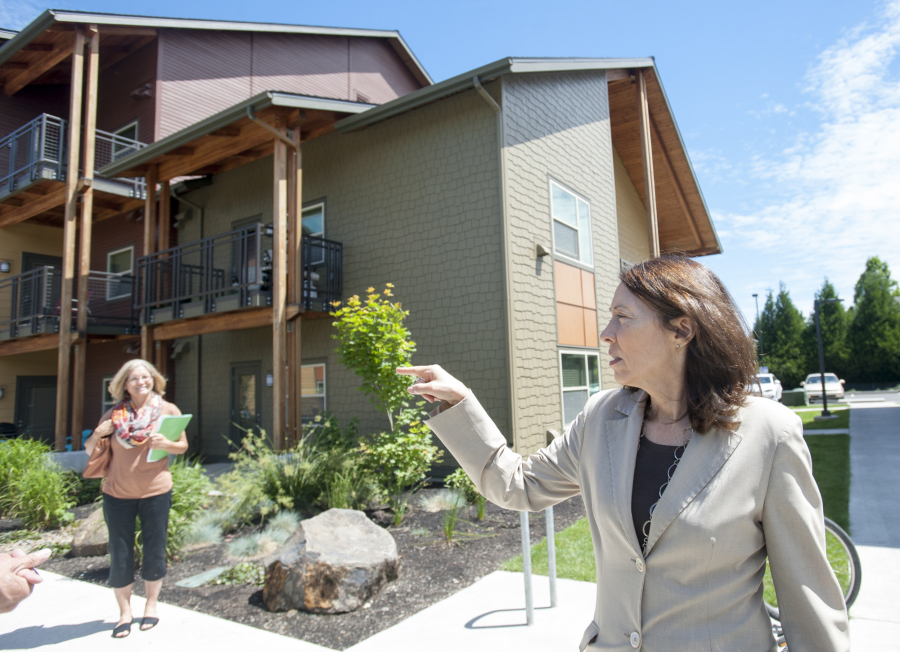 U.S. Sen. Maria Cantwell, right, visits 1st Street Apartments, a complex in east Vancouver built using low-income housing tax credits.