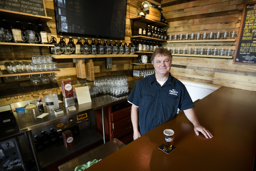 Gary Paul, a longtime home brewer, opened Trusty Brewing Co. with his wife, Andrea, earlier this year at the corner of Evergreen Boulevard and Broadway.