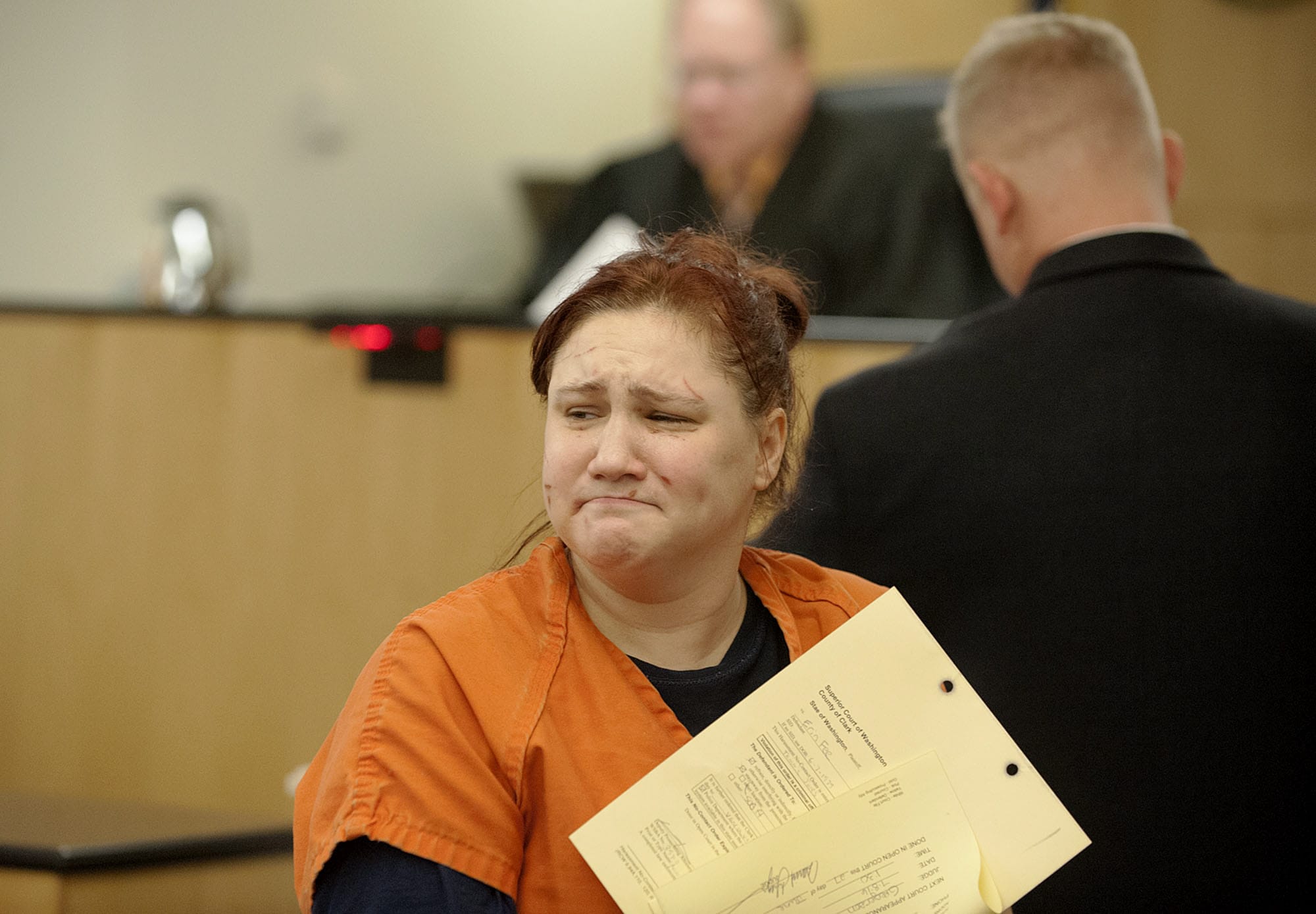 Erin Lauris Fee, 37, of Vancouver makes a first appearance on pending first-degree assault charges Monday morning in Clark County Superior Court.