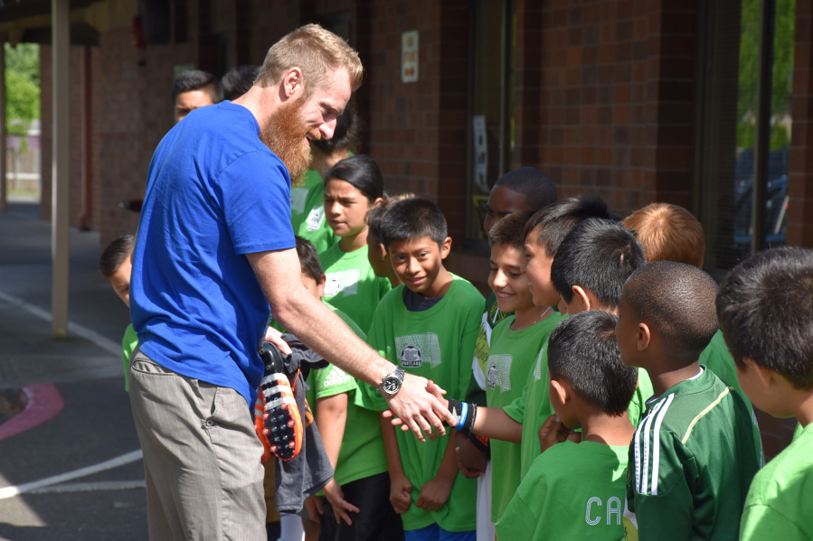 Harney Heights: Portland Timbers defender Nat Borchers spends time with Martin Luther King Elementary School&#039;s King Cubs college-prep soccer club on May 17, teaching the kids about respect, education and hard work.
