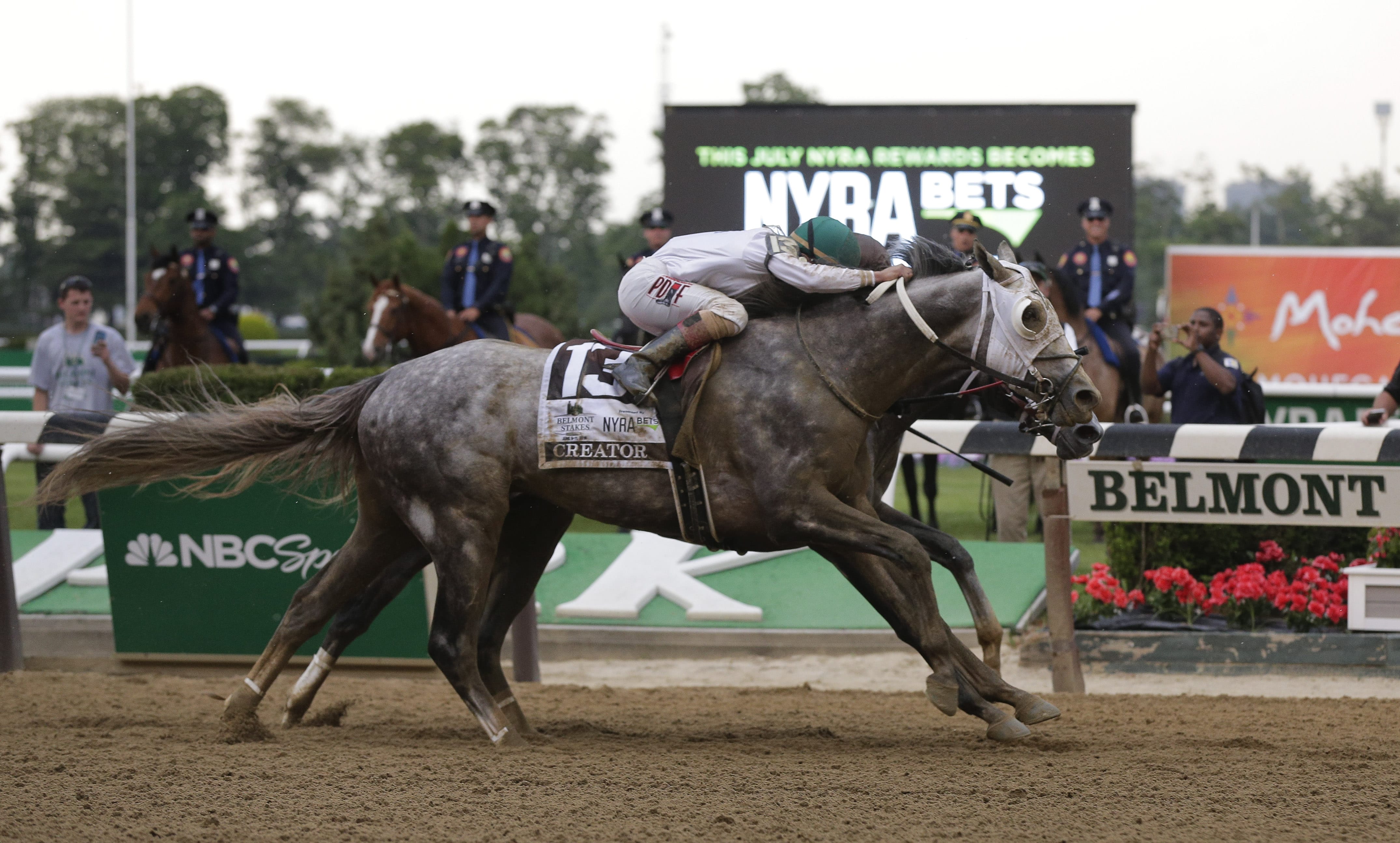 Creator, with jockey Irad Ortiz Jr. up, edges out Lani, with Yutaka Take up, to win the 148th running of the Belmont Stakes horse race, Saturday, June 11, 2016, in Elmont, N.Y.