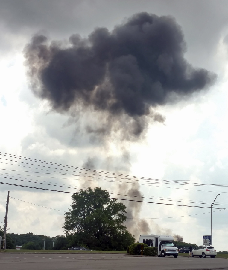 Smoke billows from the crash of a Blue Angels F/A-18 fighter jet Thursday in Smyrna, Tenn. Officials said the pilot, Marine Capt. Jeff Kuss, was killed.