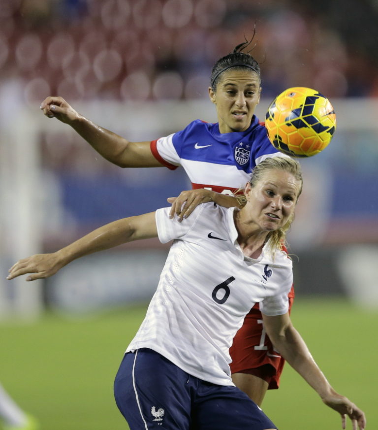 France midfielder Amandine Henry (6) battles with United States midfielder Carli Lloyd for a header during the first half of a women's friendly soccer match in Tampa, Fla., in 2014. Henry is quickly showing why she is regarded as one of the world&#039;s best players. She is with the Portland Thorns and might be the biggest star from Europe to join the National Women's Soccer League, which is in its fourth season.